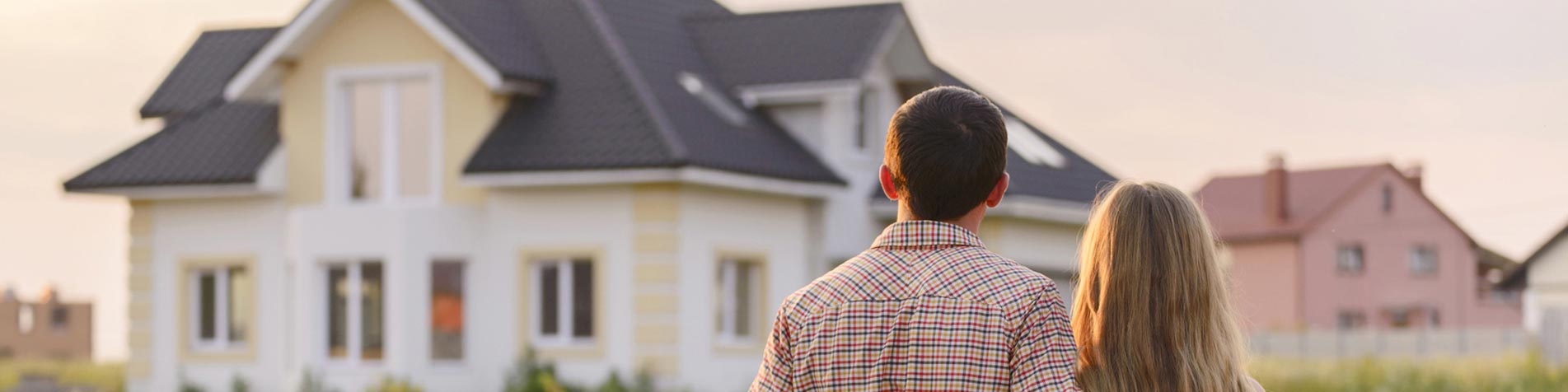 Couple Looking At New Home